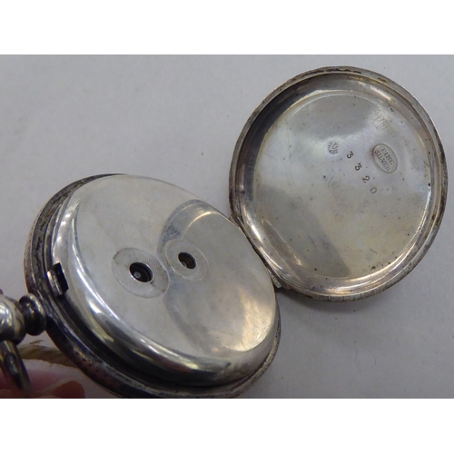 220 - A silver cased pocket watch, faced with a Roman dial