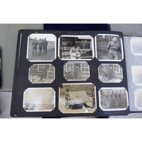 230 - Korean War related memorabilia: to include period photographs; and a Peace medal awarded to one Alan... 