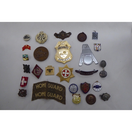 232 - Mainly military themed badges and buttons(Please Note: this lot is subject to the statement made in ... 