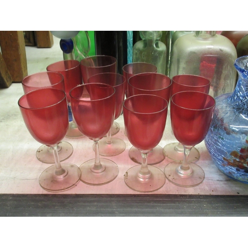 240 - Glassware: to include a clear and cranberry coloured decanter and stopper