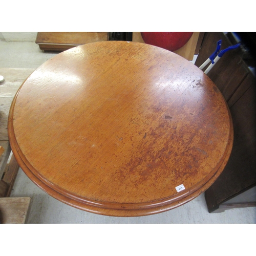 251 - A late Victorian mahogany pedestal centre table with a thumb moulded edge, raised on a carved tripod... 