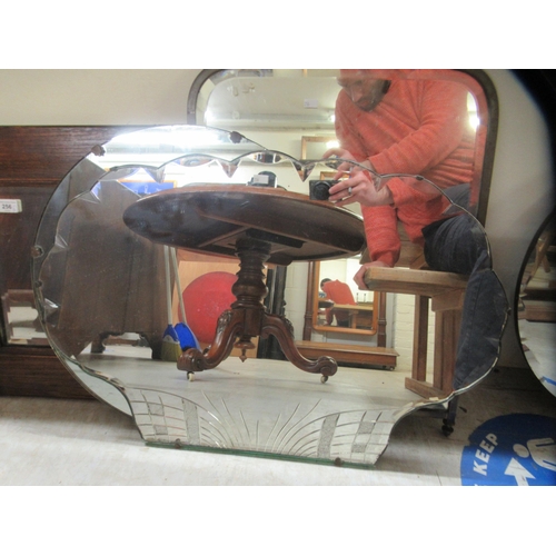 256 - Six variously framed and ornamented mirrors  largest 29