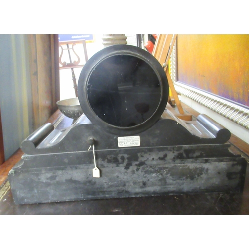 265 - A late Victorian slate cased mantel clock; faced by a Roman dial, on a plinth  11