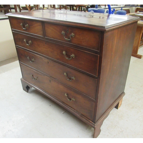 266 - A George III mahogany five drawer dressing chest, raised on bracket feet  36