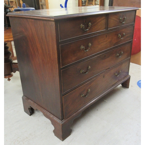 266 - A George III mahogany five drawer dressing chest, raised on bracket feet  36