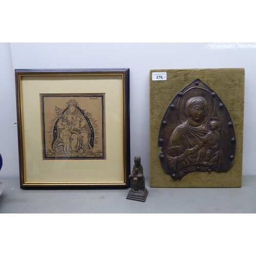 276 - A mixed lot: to include a Russian inspired icon, pressed brass plaque, laid on a fabric backboard&nb... 