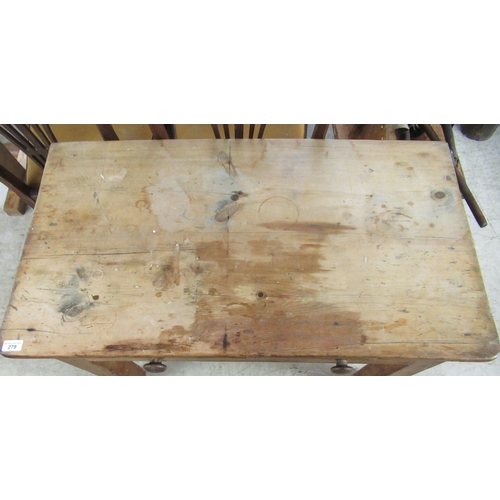 279 - A late 19thC rustic pine, two drawer kitchen table, raised on square, tapered legs  29