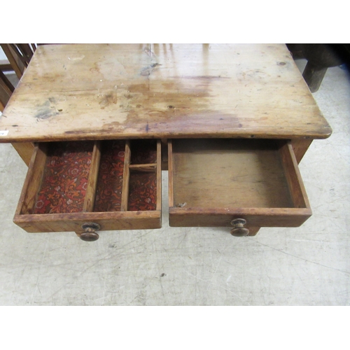 279 - A late 19thC rustic pine, two drawer kitchen table, raised on square, tapered legs  29