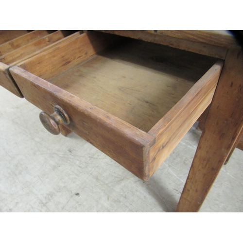 279 - A late 19thC rustic pine, two drawer kitchen table, raised on square, tapered legs  29