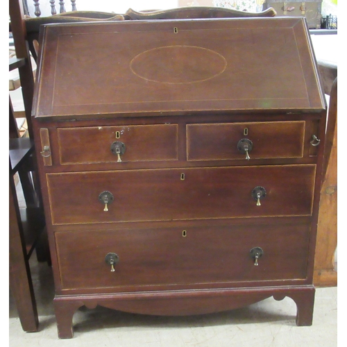 281 - An Edwardian lady's string inlaid mahogany  bureau with a fall flap, over two short/two long drawers... 