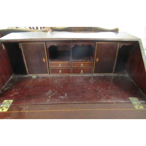 281 - An Edwardian lady's string inlaid mahogany  bureau with a fall flap, over two short/two long drawers... 