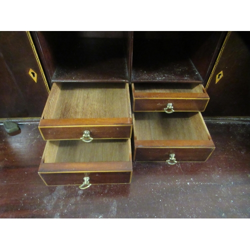 281 - An Edwardian lady's string inlaid mahogany  bureau with a fall flap, over two short/two long drawers... 