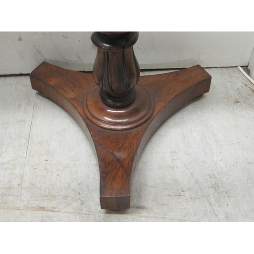 289 - A William IV rosewood lyre design sheet music stand, raised on a triform platform  47