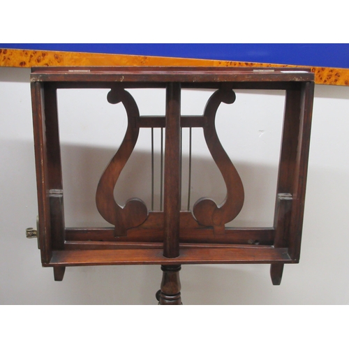 289 - A William IV rosewood lyre design sheet music stand, raised on a triform platform  47