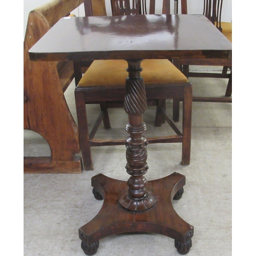 29 - A William IV mahogany tip-top table, raised on a spiral turned column and quatrefoil base and turned... 