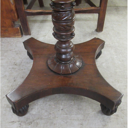 29 - A William IV mahogany tip-top table, raised on a spiral turned column and quatrefoil base and turned... 