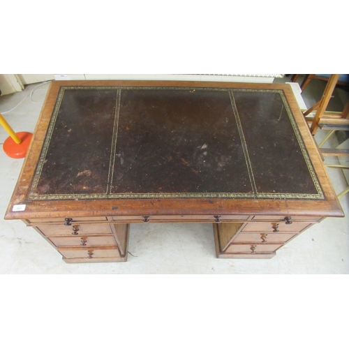 293 - A late Victorian mahogany, twin pedestal, nine drawer desk, on a plinth  30