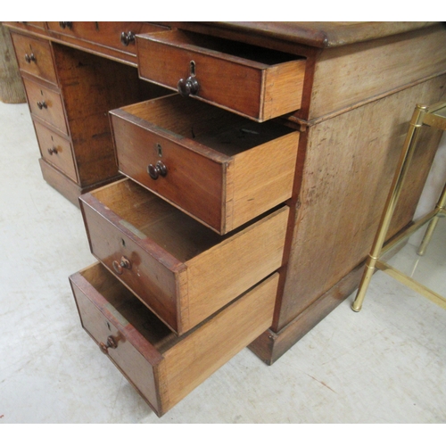 293 - A late Victorian mahogany, twin pedestal, nine drawer desk, on a plinth  30