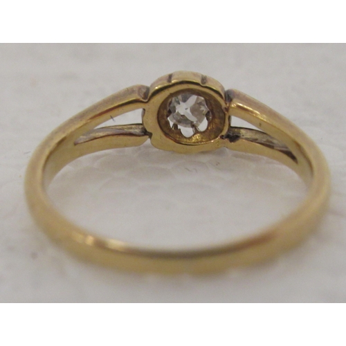 313 - An 18ct gold gypsy ring, set with a single diamond