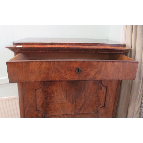 331 - A 19thC Biedermeier inspired mahogany secretaire a'abattant, the platform top over a frieze drawer, ... 