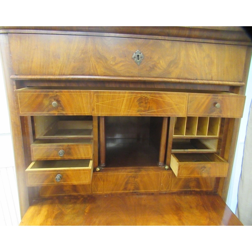 331 - A 19thC Biedermeier inspired mahogany secretaire a'abattant, the platform top over a frieze drawer, ... 