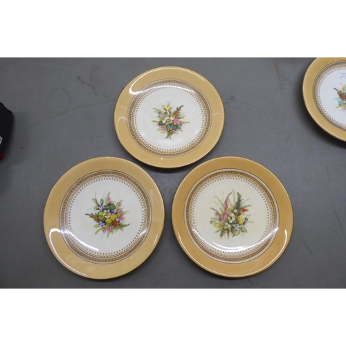 38 - A Royal Worcester china dessert service  comprising a comport and six side plates  9