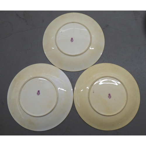 38 - A Royal Worcester china dessert service  comprising a comport and six side plates  9