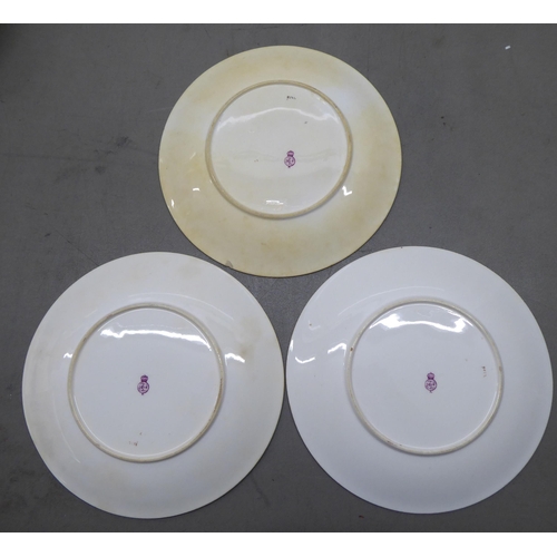 38 - A Royal Worcester china dessert service  comprising a comport and six side plates  9