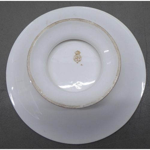 38 - A Royal Worcester china dessert service  comprising a comport and six side plates  9