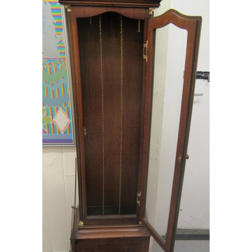 52 - A modern yewwood longcase clock; the movement faced by a Roman dial with (three weights and pendulum... 