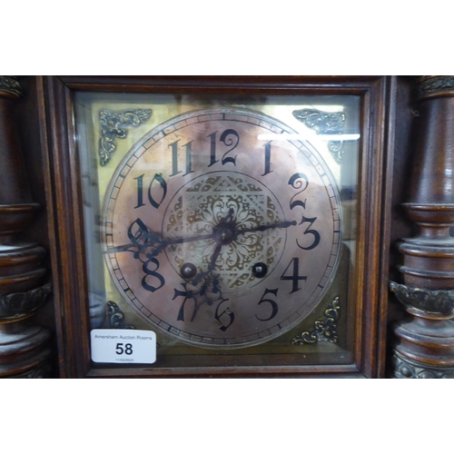 58 - A 20thC beech and walnut cased wall clock; faced by an Arabic dial  27