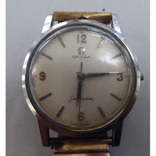 59 - An Omega Seamaster stainless steel cased wristwatch (damaged), faced by an Arabic and baton dial