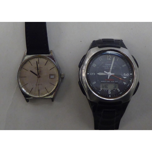 61 - Seven modern wristwatches and a brass cased pocket compass: to include Casio and Ingersol