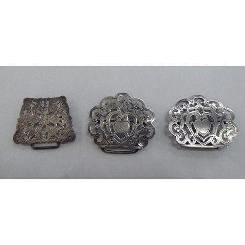 65 - Silver and white metal collectables: to include three napkin rings; and a two part silver nurse's be... 