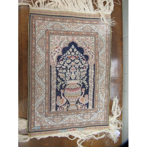 7 - A silk prayer mat  14