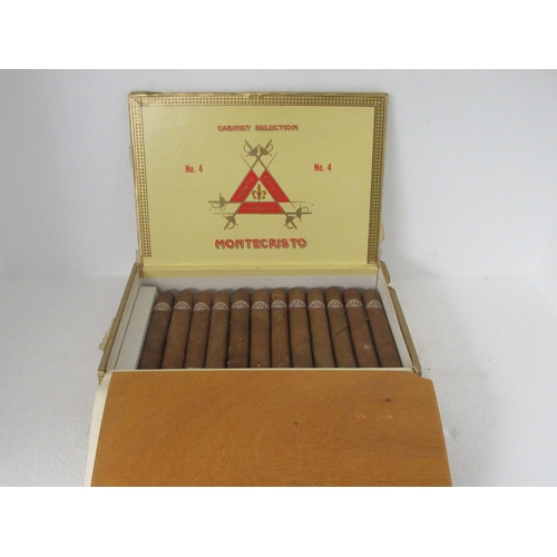 75 - Cigars, viz. ten Montecristo No.4; and five packets of King Edward Invincible