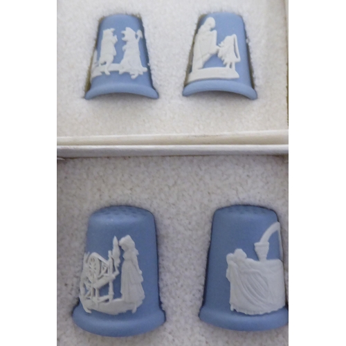 87 - Four pairs of Wedgwood powder blue jasperware thimbles  boxed