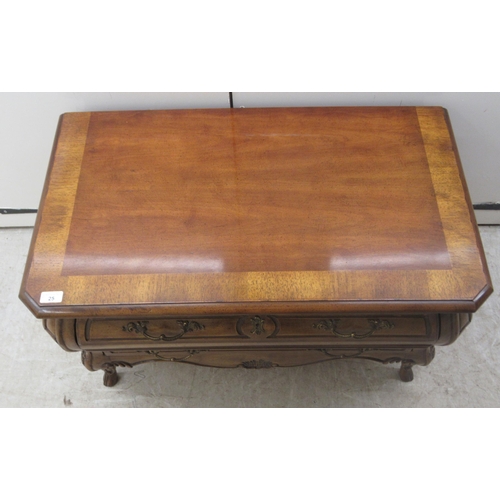 25 - A modern American cherrywood, two drawer dressing chest, raised on stubby cabriole legs  21