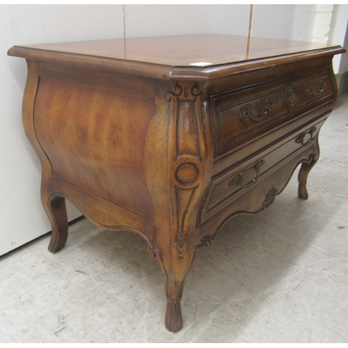 25 - A modern American cherrywood, two drawer dressing chest, raised on stubby cabriole legs  21