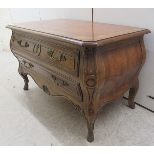 25 - A modern American cherrywood, two drawer dressing chest, raised on stubby cabriole legs  21