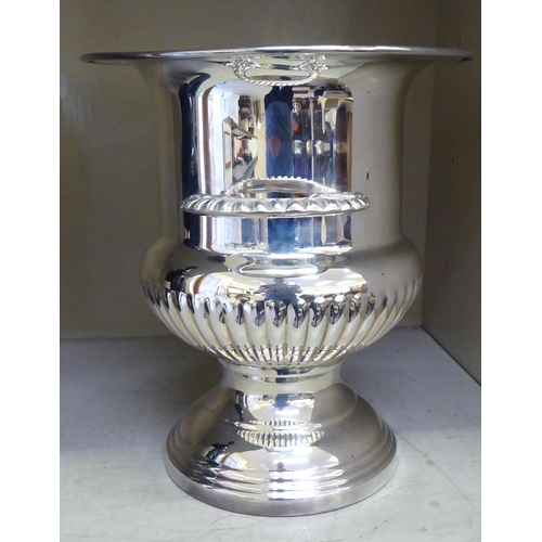 31 - A silver plated pedestal urn design, twin handled Champagne bucket  10