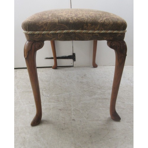 10 - A 1930s walnut framed stool with a tapestry upholstered top, raised on cabriole legs