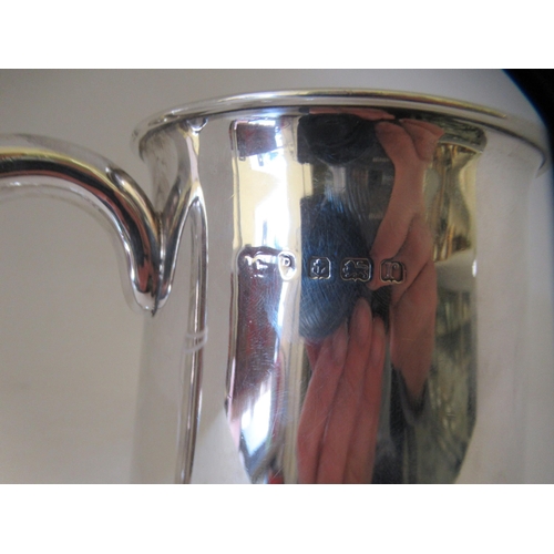 100 - A silver one pint tankard  Birmingham 1916 