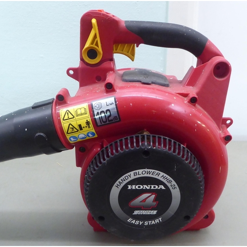 118 - A Honda HHB 25 4 stroke easy start petrol driven leaf blower 