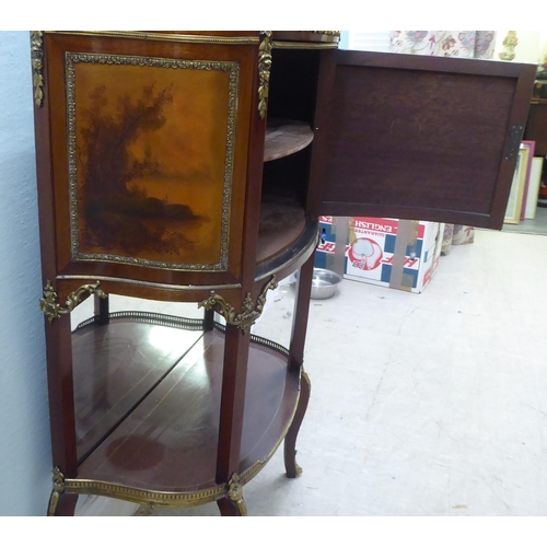 122 - A 20thC reproduction of a 19thC French side cabinet with a pierced brass gallery border, over a faux... 