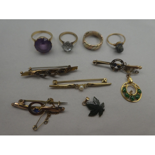 135 - Gold and yellow metal items of personal ornament: to include bar brooches and a 9ct bi-coloured gold... 