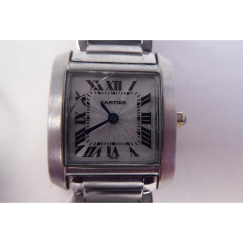 14 - A ladies Cartier stainless steel cased bracelet watch, faced by a Roman dial