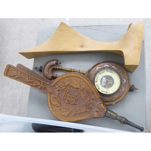 158 - 20thC wooden and other collectables: to include an Edwardian oak cased aneroid barometer  21