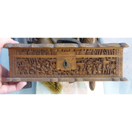 158 - 20thC wooden and other collectables: to include an Edwardian oak cased aneroid barometer  21