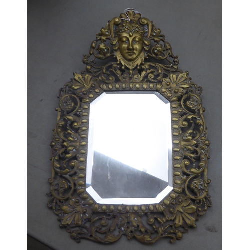 163 - 19thC and later metalware: to include an ornately cast brass mirrored frame  14